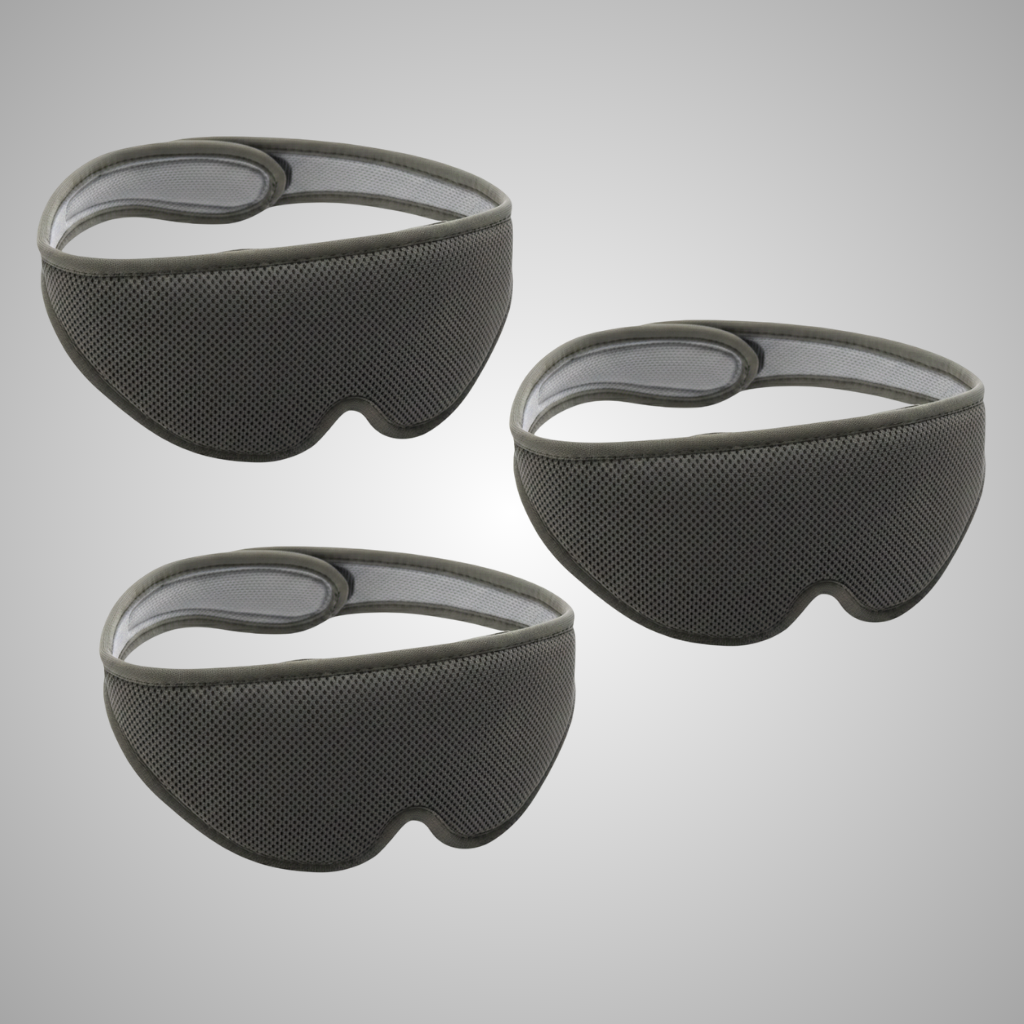 Three black Rest'd sleep masks on a gray background