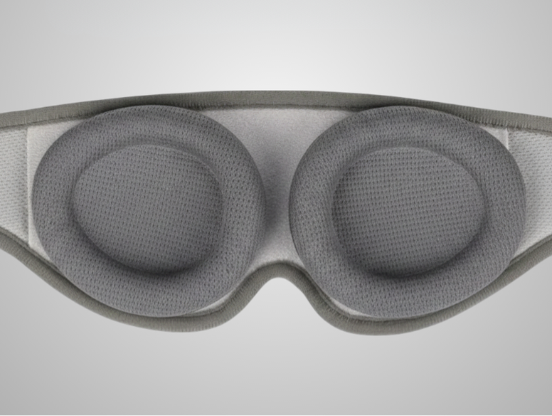 Gray Rest'd eye mask with two circular pressure points on a light gray background
